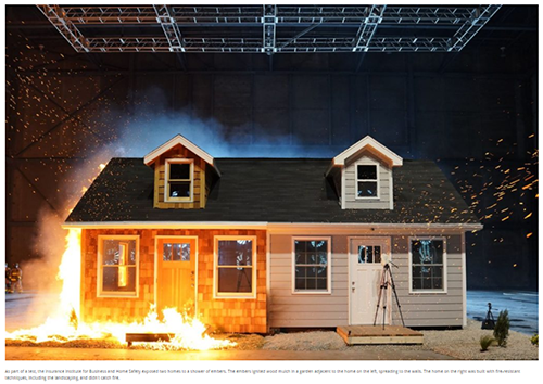 Wildfire catching a house